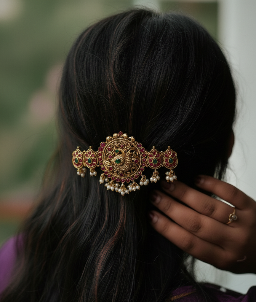 Person wearing a decorative hair clip with intricate design